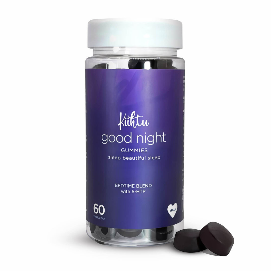 Good Night sleep gummies. Gummy bottle by Kiihtu in a dark purple label, with 2 gummies in front of the bottle